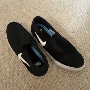 Nike SB Black Slip-On Sneakers with White Swoosh